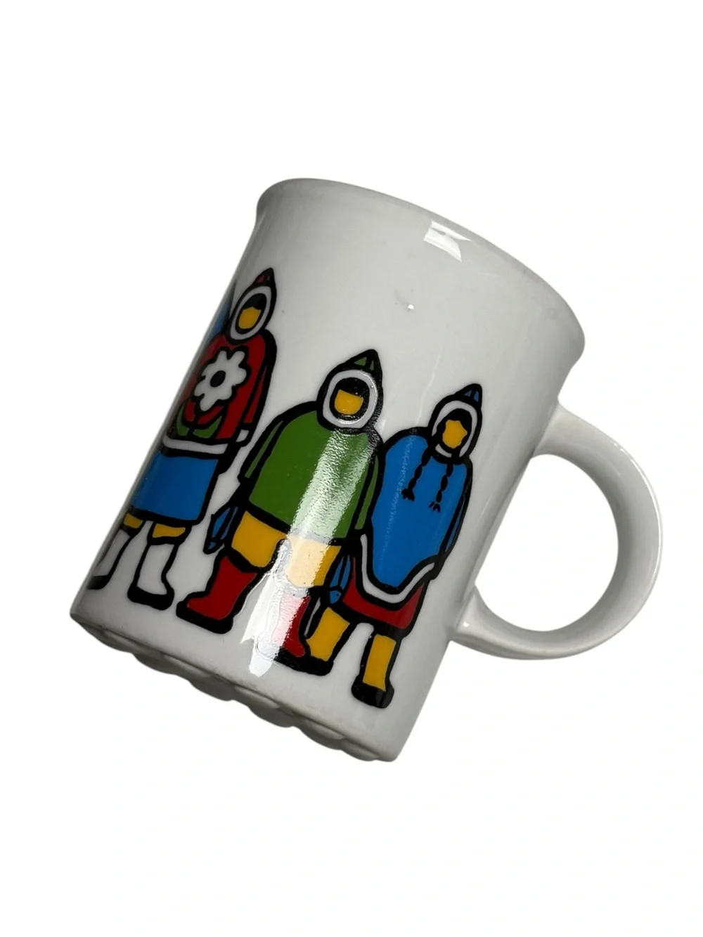 Marc Tetro coffee mug featuring Inuit family artwork by Danesco.
